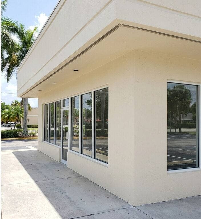 Commercial storefront exterior after pressure washing Miami